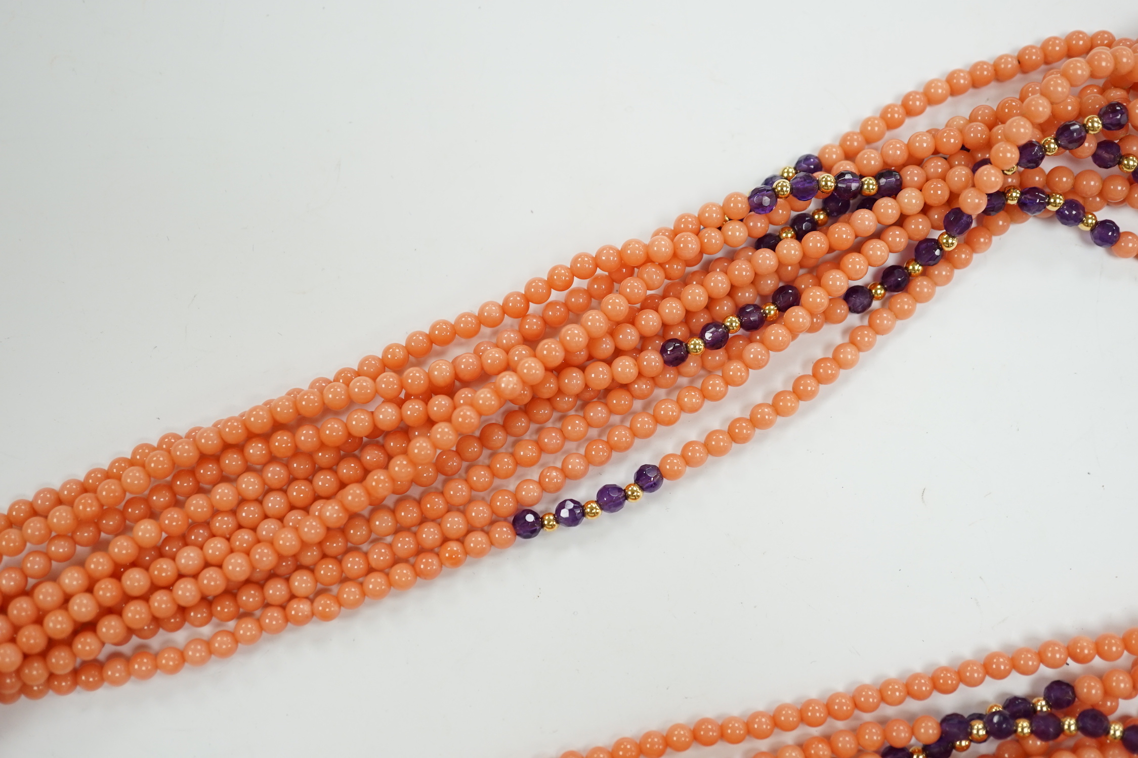 A recent coral, amethyst and yellow metal bead sautoire necklace, approx. 126cm.